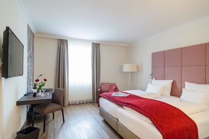 Hotel Goldener Fisch - Zimmer - Foto: goldener-fisch.at